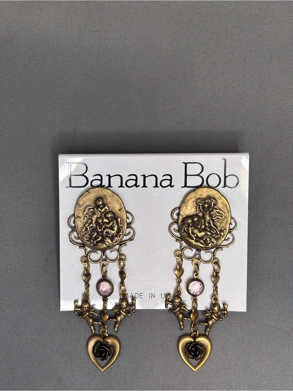 Banana Bob Gold-Tone Cherub Medallion Dangle Earrings with Pink Accents